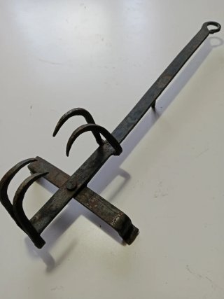 Tostador antiguo de pan hierro forjado