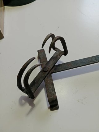 Tostador antiguo de pan hierro forjado