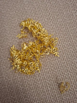 Orecchini o anelli capelli a forma di foglia oro