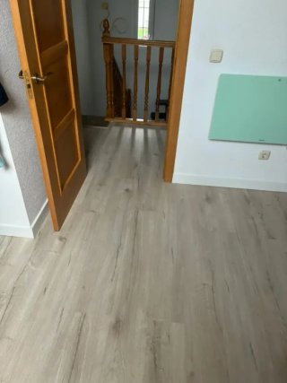 Instalación Tarima Laminada y Suelo Vinílico.