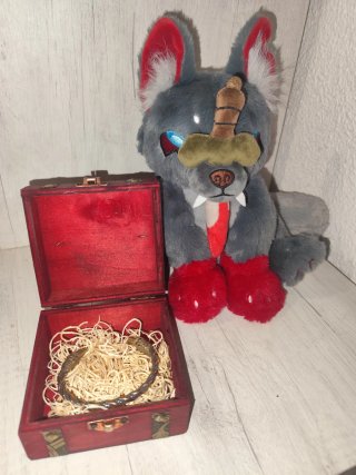 Peluche lobo y pulsera Odín