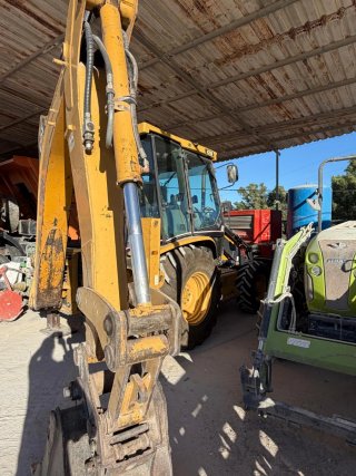 Maquina caterpillar 428D