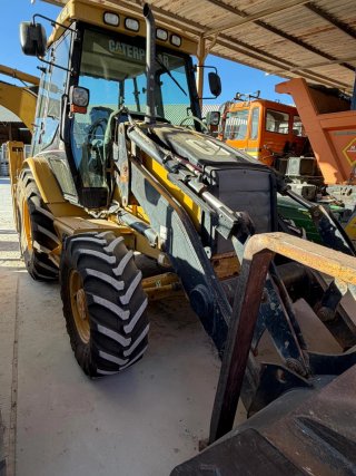 Maquina caterpillar 428D
