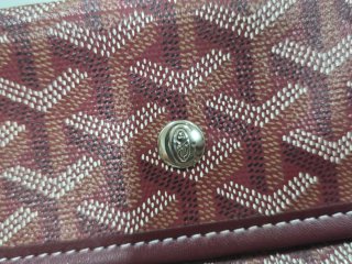 Pochette Goyard marrone