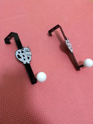 Colgador de puerta con diseño de vaca