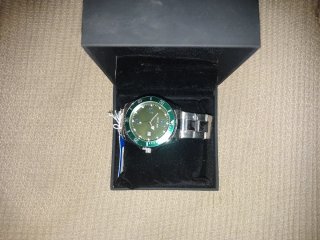 Reloj Skyline Verde y Plateado Como Nuevo