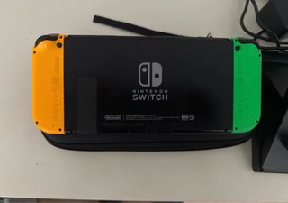 Nintendo Switch  + funda + cargador