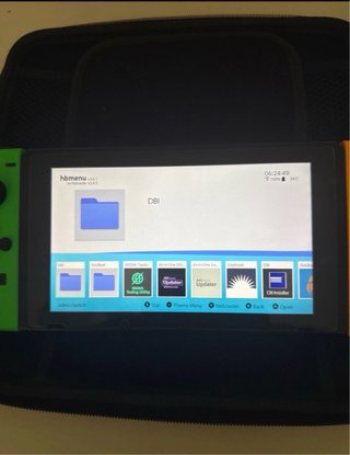Nintendo Switch  + funda + cargador