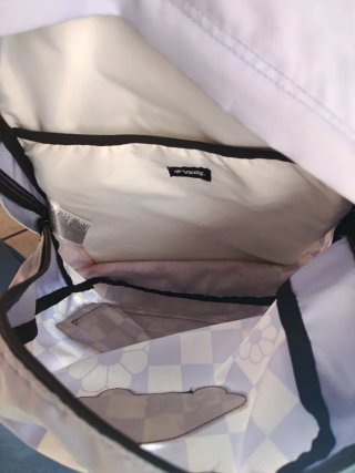 Zaino Vans lilla a scacchi con fiori