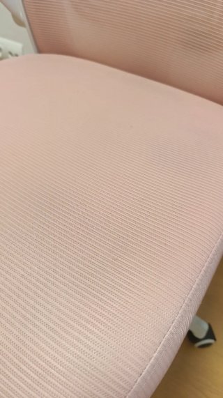 Silla de oficina ergonómica rosa
