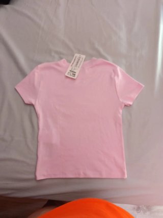 Camiseta rosa FB Sister con lazo