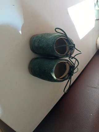 Zapatitos de bebé verde