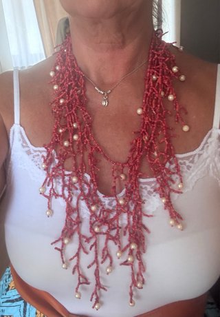 Collane in perline turchesi e rosse con perle