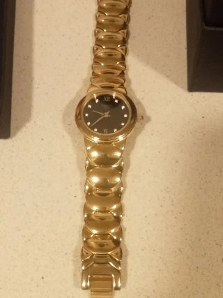 Reloj Tissot Dorado con Detalles Diamante