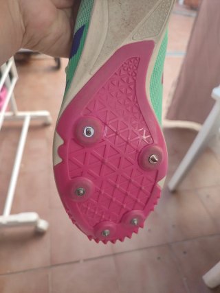 Zapatillas Adidas clavos verdes y rosas