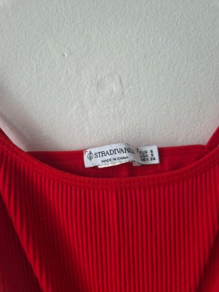 Top rosso a costine