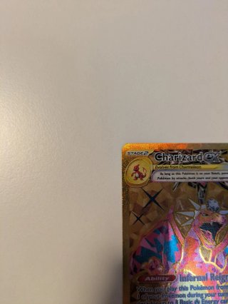 Carta Pokémon Charizard EX 228/197 Dorada