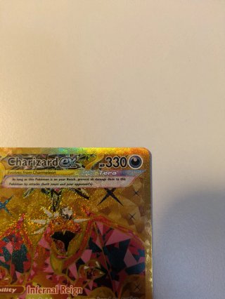 Carta Pokémon Charizard EX 228/197 Dorada