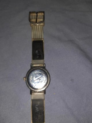 Reloj Nike Dorado y Verde