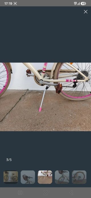 Bicicleta blanca con cesta, 24 pulgadas.