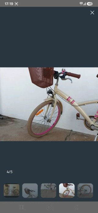 Bicicleta blanca con cesta, 24 pulgadas.