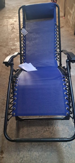 Sillón reclinable azul plegable