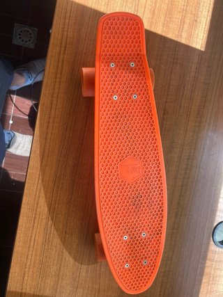 Monopatín naranja