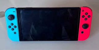 Nintendo Switch OLED + Ring Fit Adventure