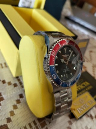 Reloj Invicta Nuevo Multicolor y Plateado