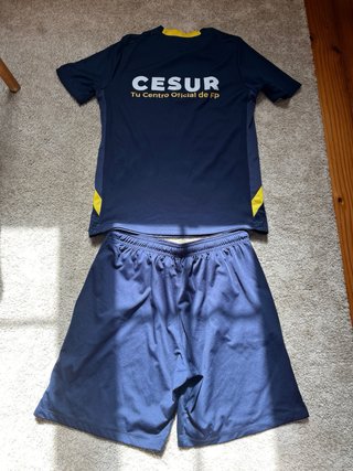 Conjunto deportivo Macron azul