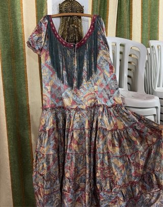 Traje de flamenca con flecos