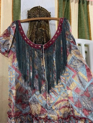 Traje de flamenca con flecos