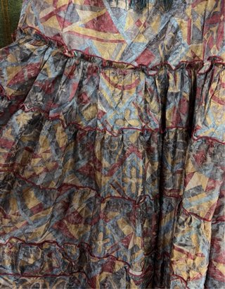 Traje de flamenca con flecos