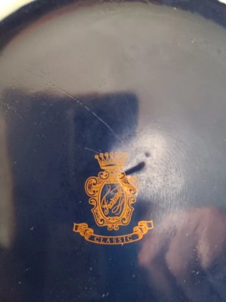 Jarrón de porcelana azul y dorado