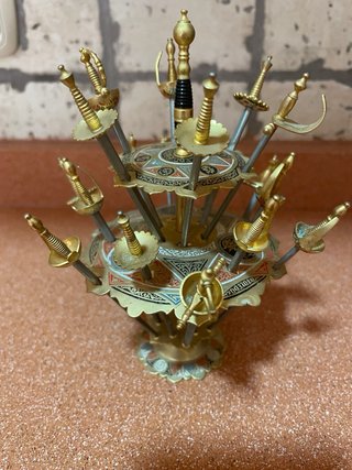 Antiguo soporte espadas palillos aperitivo