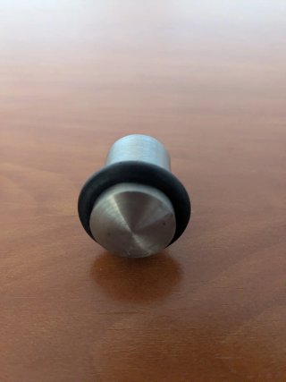 2 topes de puerta de metal con tornillo.
