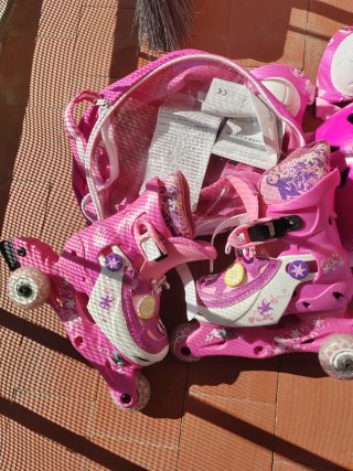 Patines rosas infantiles con protecciones