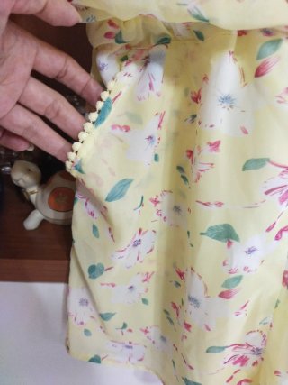 Tutina corta gialla a fiori
