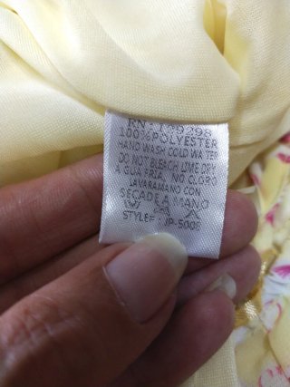Tutina corta gialla a fiori