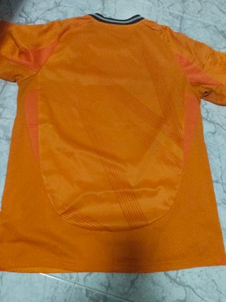 Camiseta Real Madrid Naranja