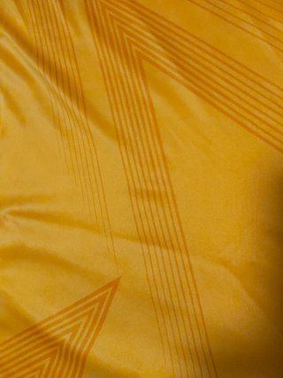 Camiseta Real Madrid Naranja