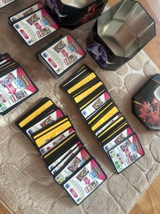 Cartas Pokémon TCG Live (+750) + dos latas