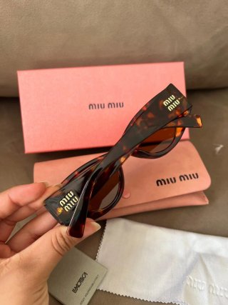 Occhiali da sole Miu Miu Carey nuovi