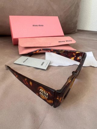 Occhiali da sole Miu Miu Carey nuovi