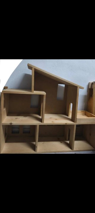 Casa de muñecas de madera