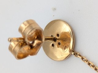 Pendiente oro 18k estrella y cadena  1 unidad