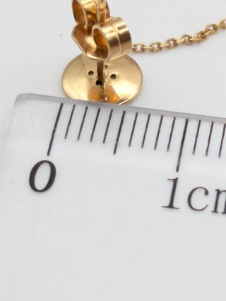 Pendiente oro 18k estrella y cadena  1 unidad