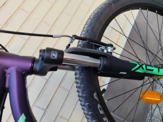 Bicicleta Orbea MX 24 XC Morada y verde.