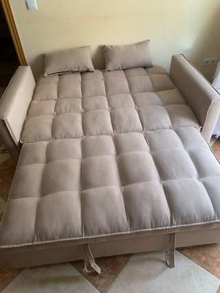 Sofá-cama beige manual