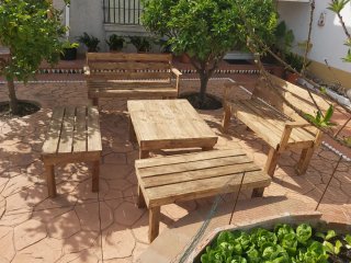 Conjunto de muebles de terraza de madera